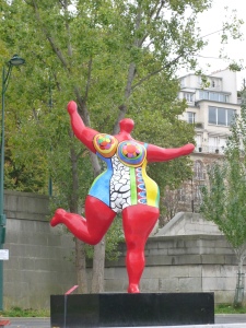 Nikki de Saint Phalle sculpture along the quay bearing her name.